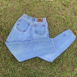 Vintage high waisted mom jeans, light wash tapered
